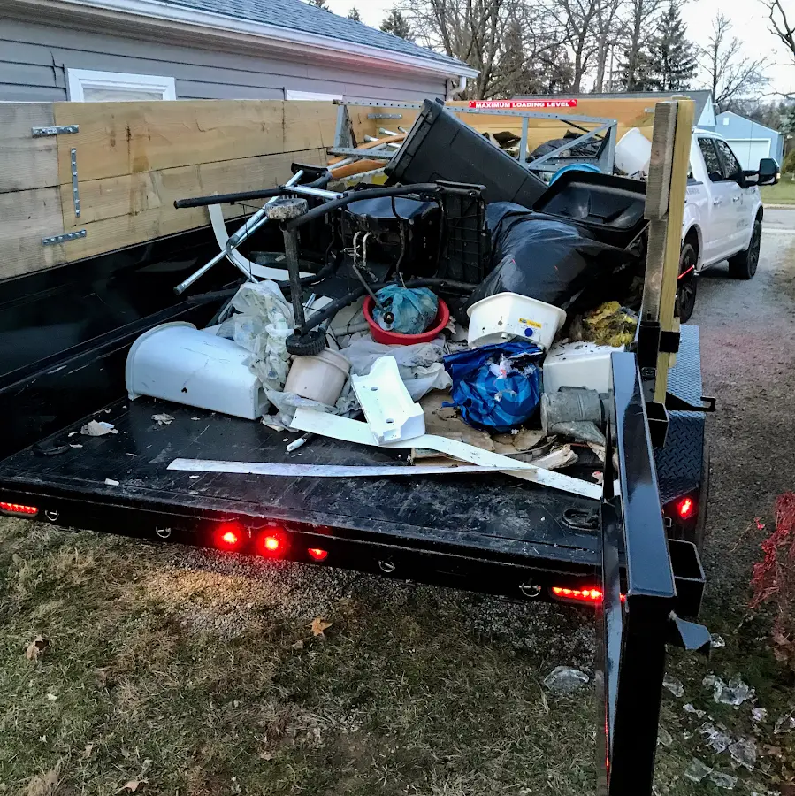 Roll-off dumpster delivered to a residential driveway in Tarboro